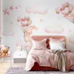 Wall murals Group of pink clouds and a bunny holding balloons