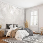 Wall murals White leaves on a grey surface