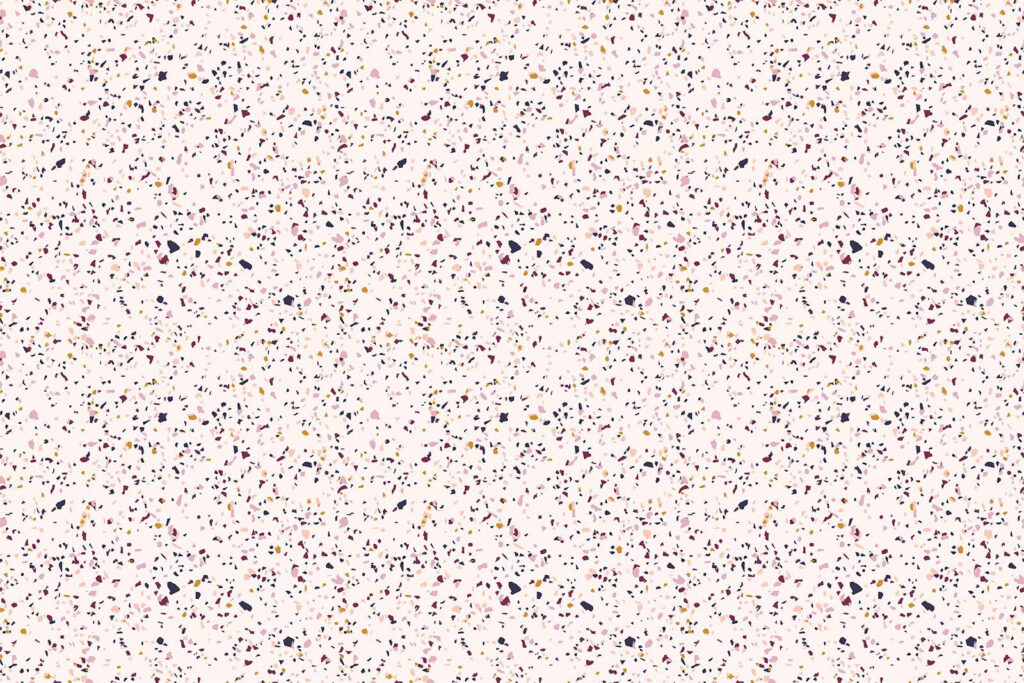 Pink speckled surface with small specks Pink speckled surface with small specks