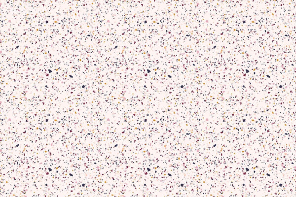 Pink speckled surface with small specks Pink speckled surface with small specks