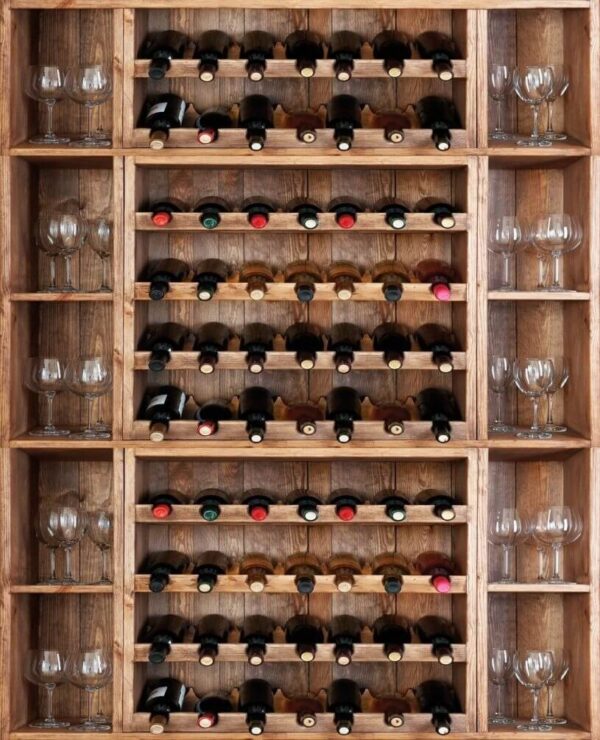 Wine bottles and glasses on a shelf Wine bottles and glasses on a shelf