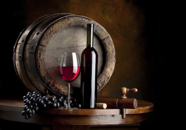 Wine bottle and glass on a table u65206p 600x419 - Wine bottle and glass on a table - tegory