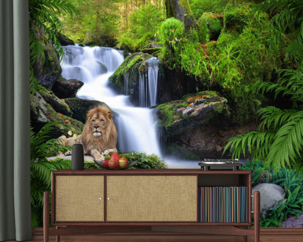 Lion lying on a rock next to a waterfall Lion lying on a rock next to a waterfall