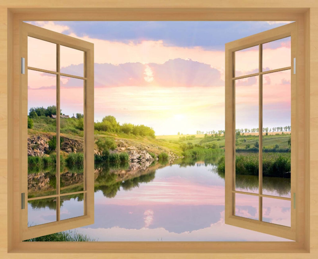 Window with a view of a river and a grassy hill Window with a view of a river and a grassy hill