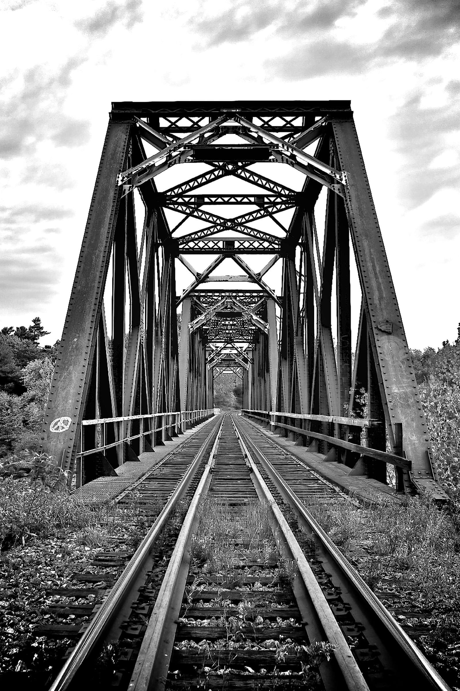 Train tracks going through a bridge u54737p - Train tracks going through a bridge - tegory