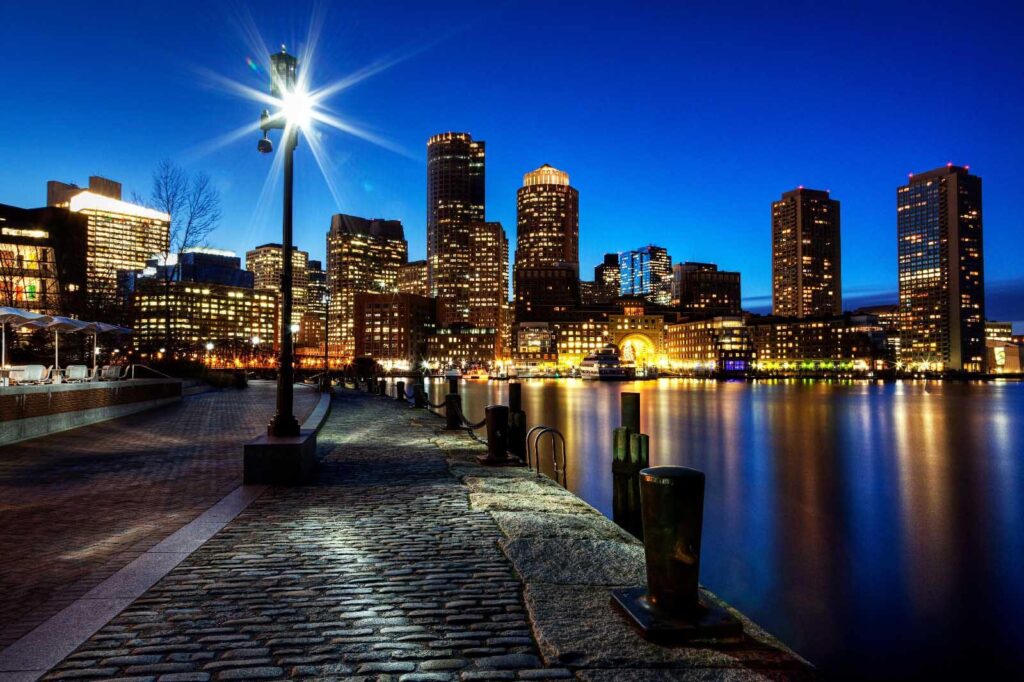 City skyline at night with a body of water u54624p 1024x682 - City skyline at night with a body of water - tegory