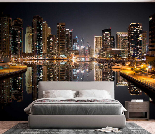 City skyline with lights reflecting on water City skyline with lights reflecting on water