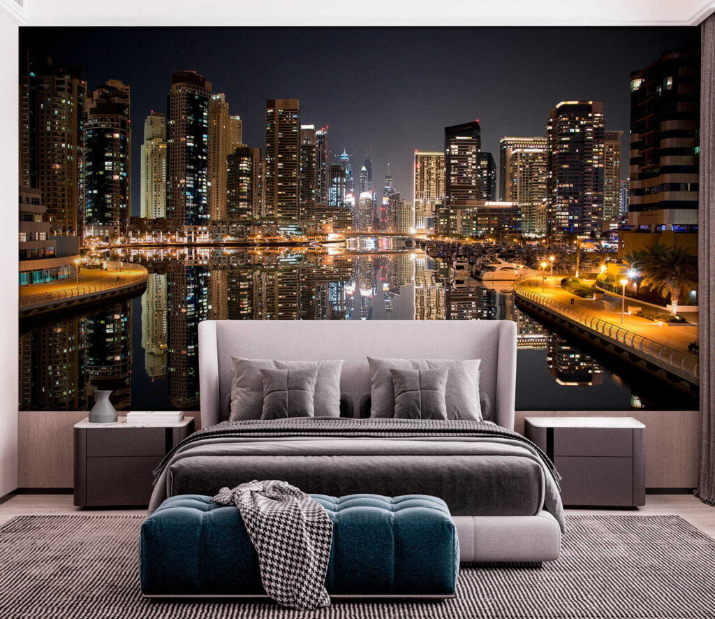 City skyline with lights reflecting on water City skyline with lights reflecting on water