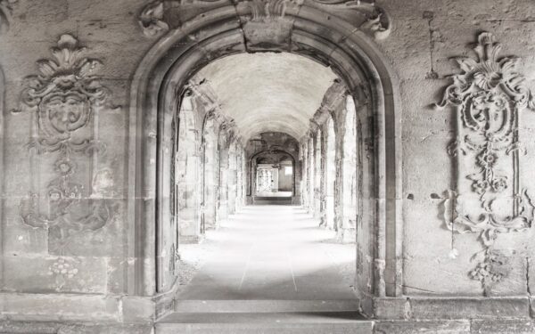 Stone archway with a stone wall Stone archway with a stone wall