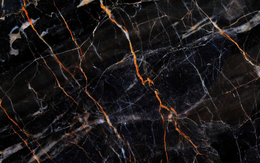 Black marble with fiery orange veins. Black marble with fiery orange veins.