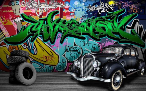 Black car with wheels in front of a colorful wall u01706p 600x375 - Black car with wheels in front of a colorful wall - tegory
