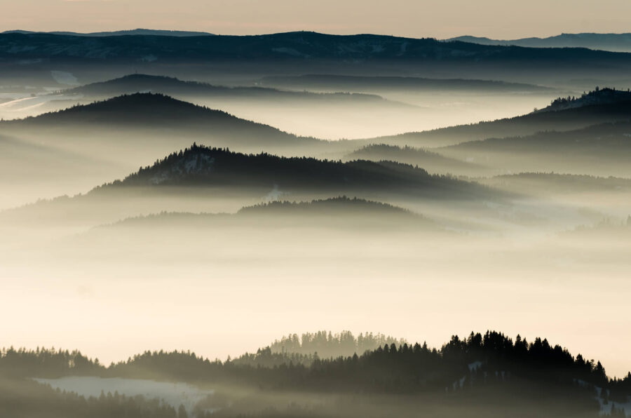 Landscape of mountains with fog