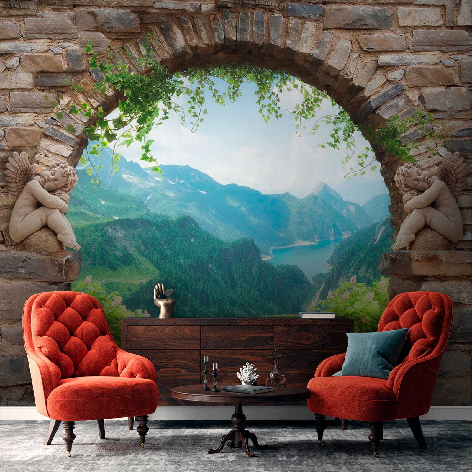 Stone archway with stone statues and a view of a valley and mountains