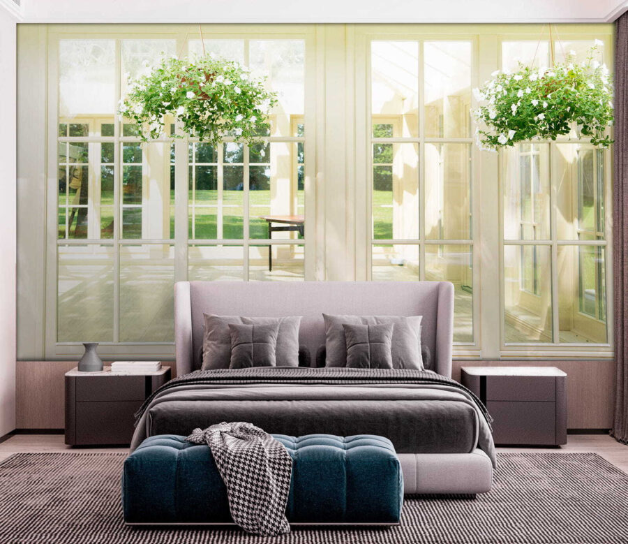 White patio door with glass windows and a potted plant from it