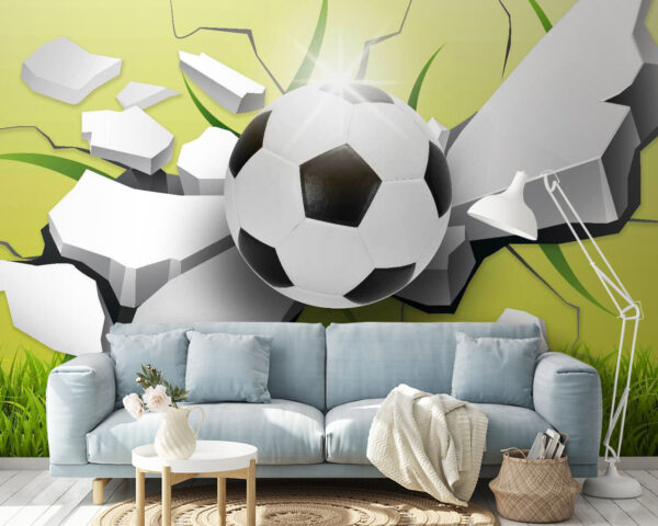 Football ball breaking through a wall Football ball breaking through a wall