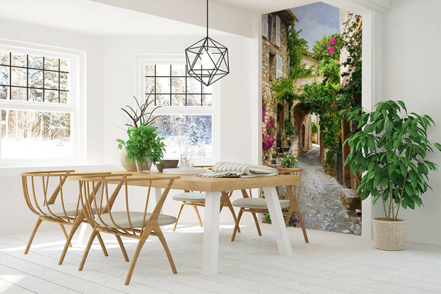 Wall murals Stone alley with flowers and plants