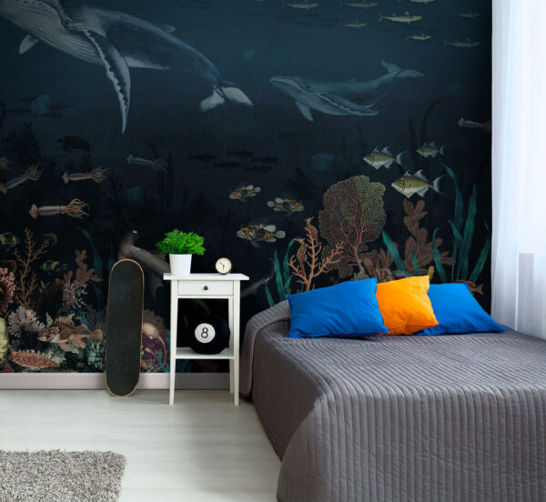 Group of fish and whales swimming in the ocean Group of fish and whales swimming in the ocean