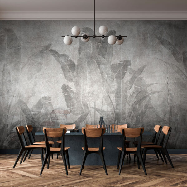 Grey wall with leaves and a brick wall