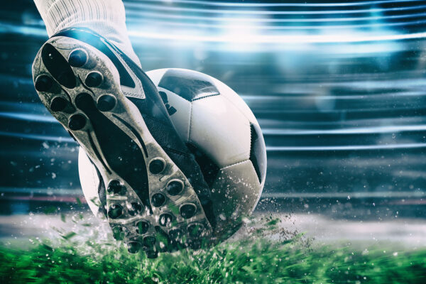A football ball kicking a ball A football ball kicking a ball