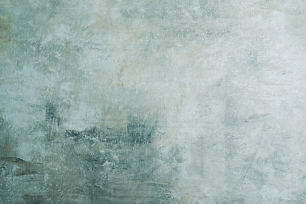 Textured cool-toned surface background. Textured cool-toned surface background.