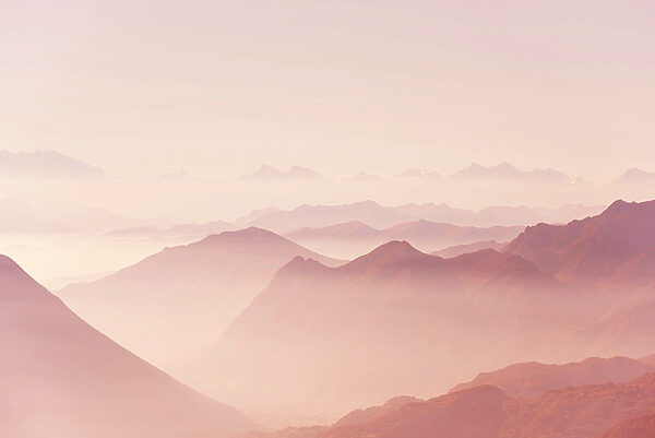 A mountain range with fog A mountain range with fog