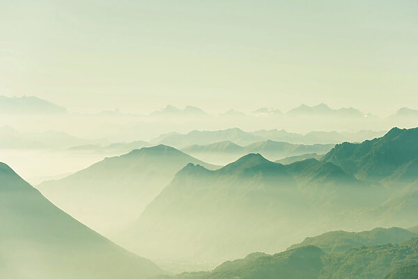 A mountain range with fog A mountain range with fog