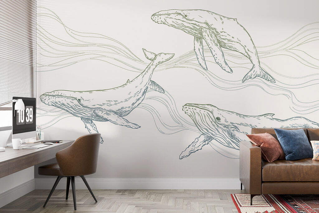 A group of whales swimming in the water A group of whales swimming in the water