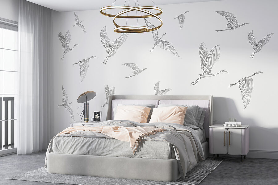 A group of birds flying A group of birds flying