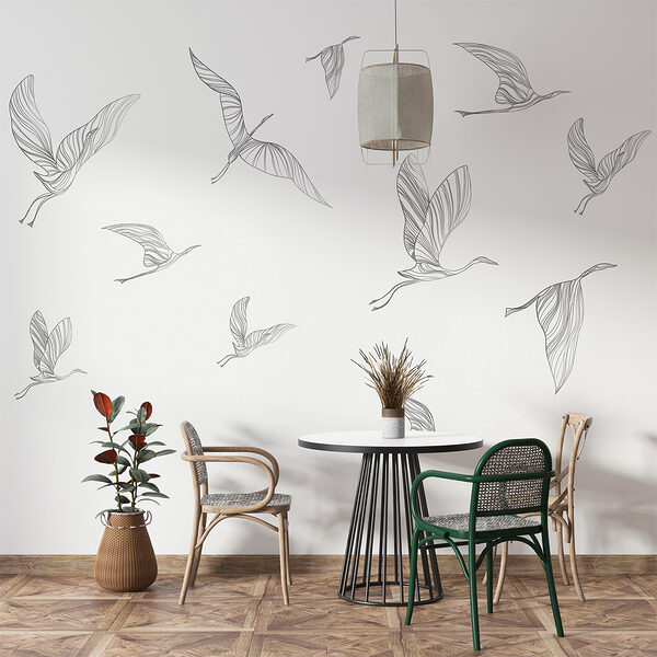 A group of birds flying A group of birds flying