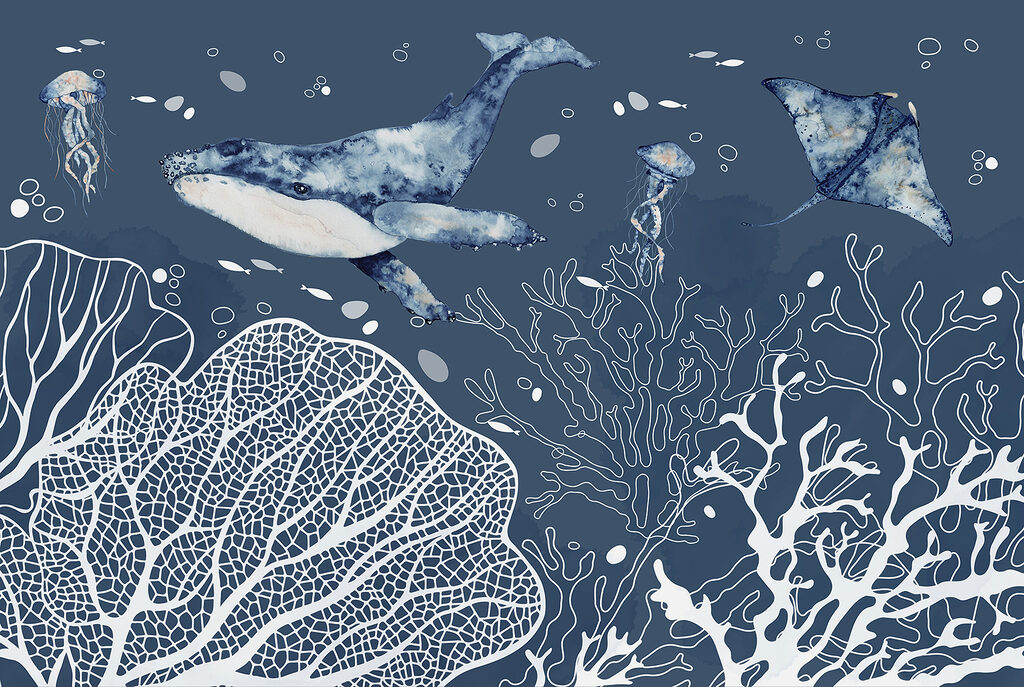 A whale and stingrays swimming in the ocean A whale and stingrays swimming in the ocean