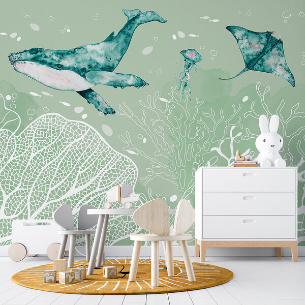 A whale and stingrays swimming in the ocean A whale and stingrays swimming in the ocean