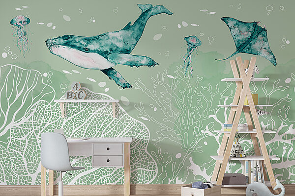 A whale and stingrays swimming in the ocean A whale and stingrays swimming in the ocean