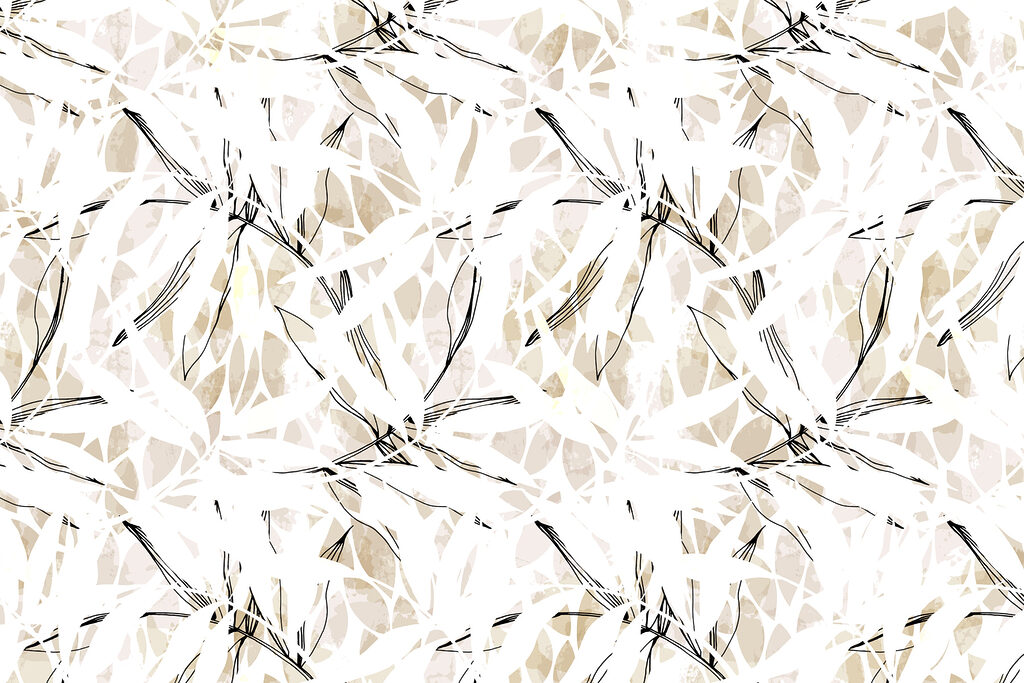 A pattern of leaves on a white surface A pattern of leaves on a white surface