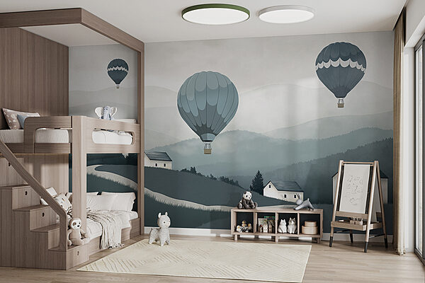 Group of hot air balloons flying over a village Group of hot air balloons flying over a village