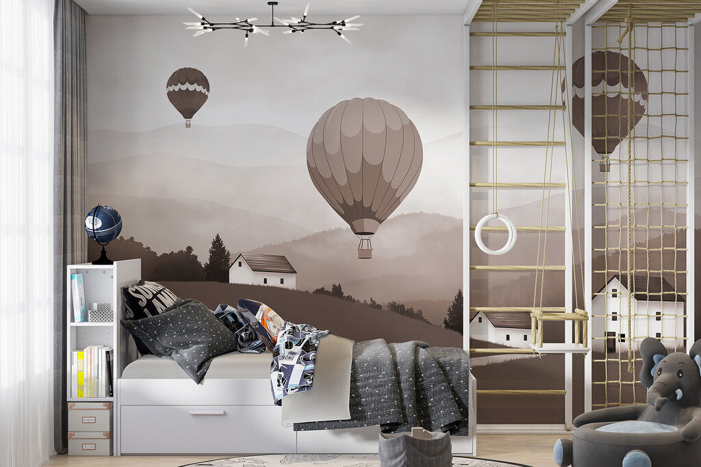 Group of hot air balloons flying over a village