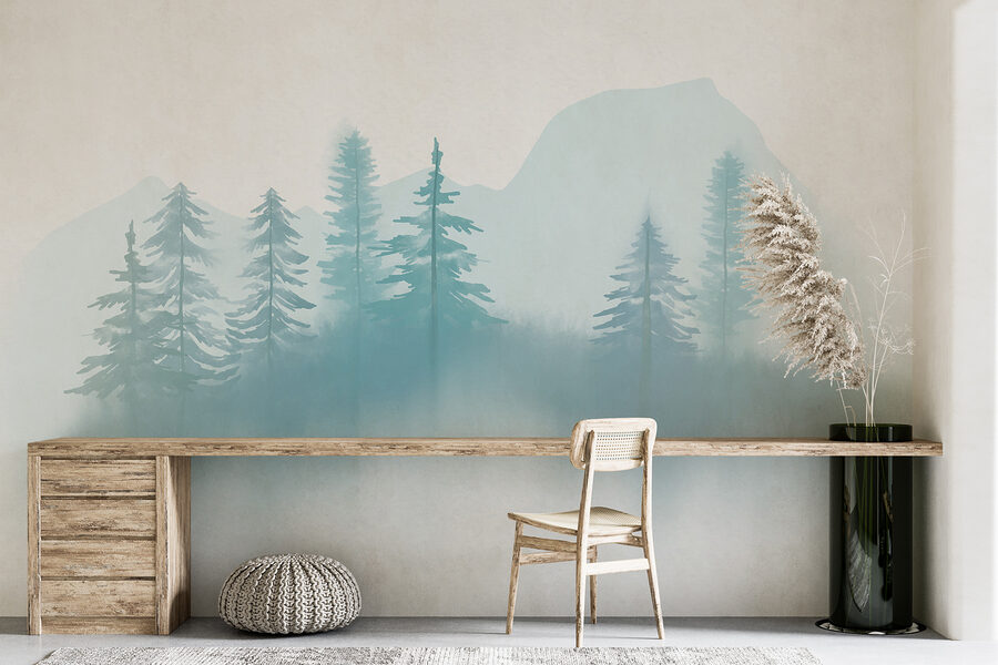 Foggy landscape with trees and mountains