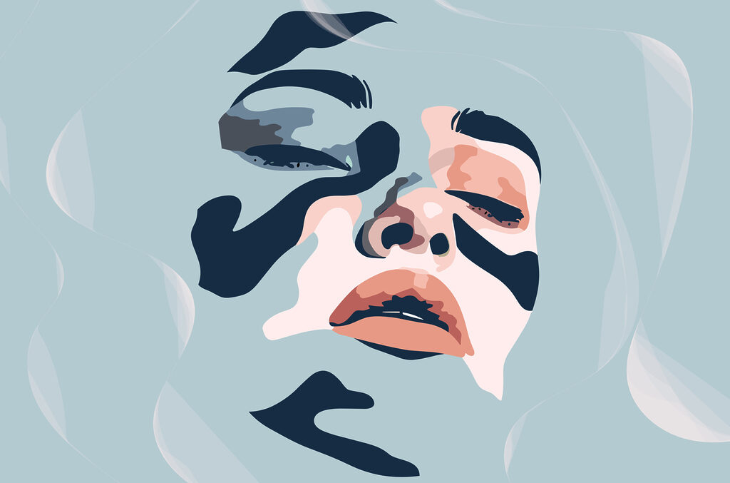 Woman's face with black and blue paint Woman's face with black and blue paint