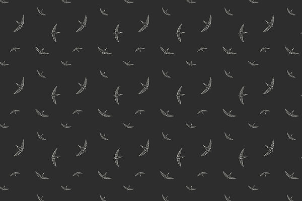Pattern of white birds on a black background Pattern of white birds on a black background