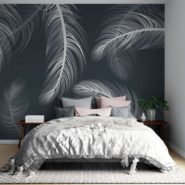 Delicate feathers dancing on dark background