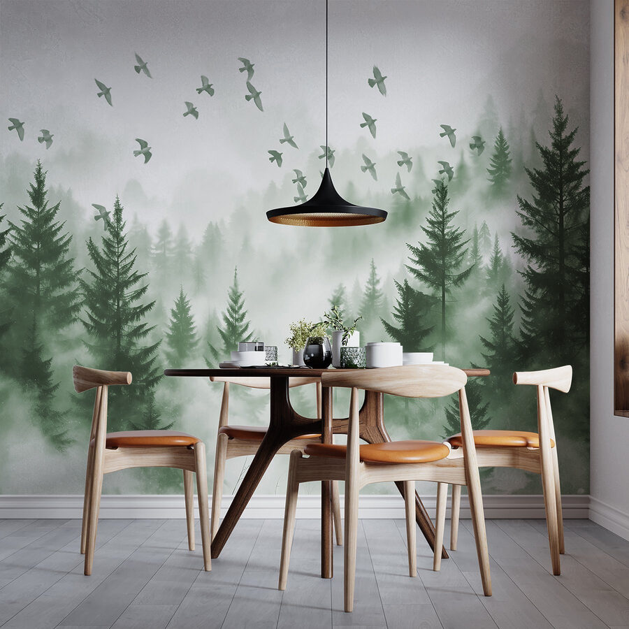 Birds flying over a forest