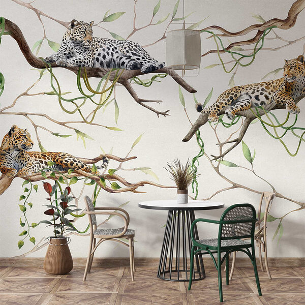 Group of leopards lying on branches Group of leopards lying on branches