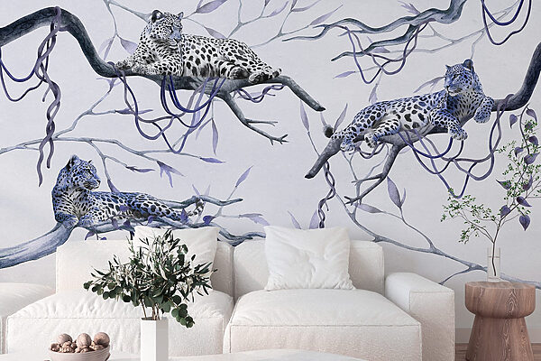 Group of leopards lying on branches Group of leopards lying on branches