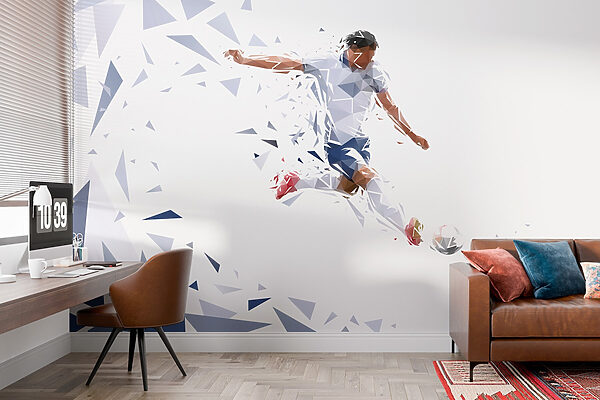 Man kicking a football ball Man kicking a football ball