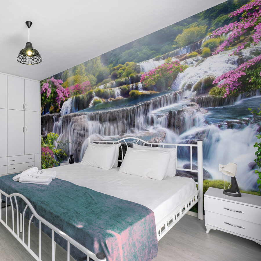Waterfall with flowers and trees