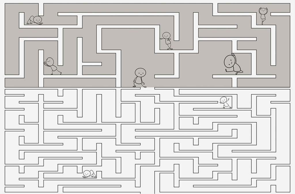 Maze with people walking on the ground Maze with people walking on the ground