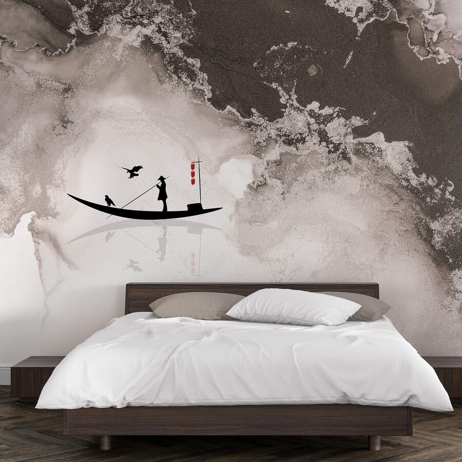 Silhouette of a man on a boat with a bird on it