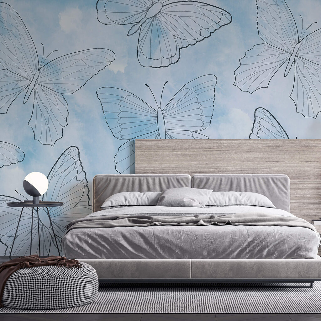 Pattern of butterflies on a blue background