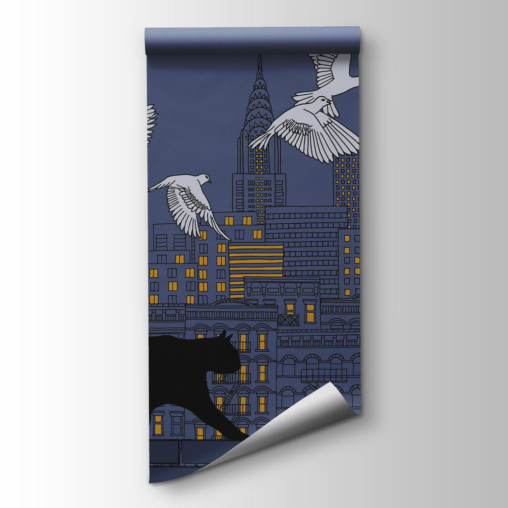 Cat walking on a wall with birds flying in the sky