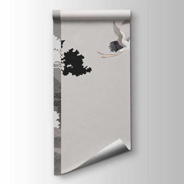 Couple of cranes flying next to a tree Couple of cranes flying next to a tree