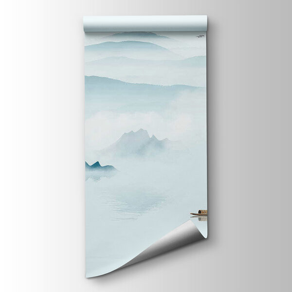 Boat in the water with mountains and birds flying